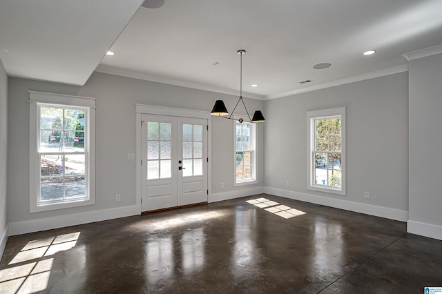 interior space featuring ornamental molding and french doors