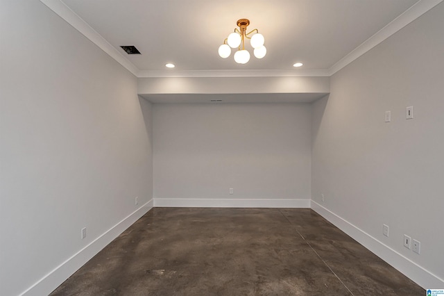 spare room featuring crown molding