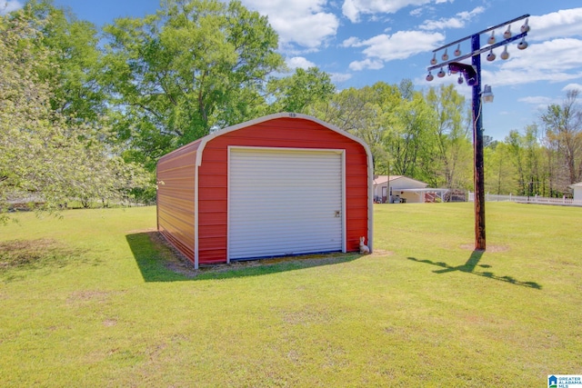 garage with a lawn