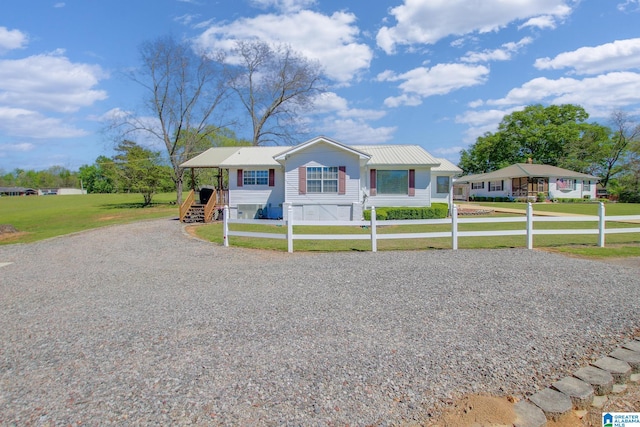 view of front of house with a porch and a front yard