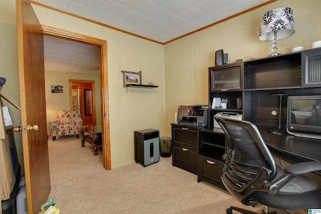 home office featuring ornamental molding and light carpet