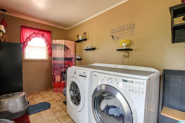 clothes washing area with separate washer and dryer, crown molding, and light tile flooring