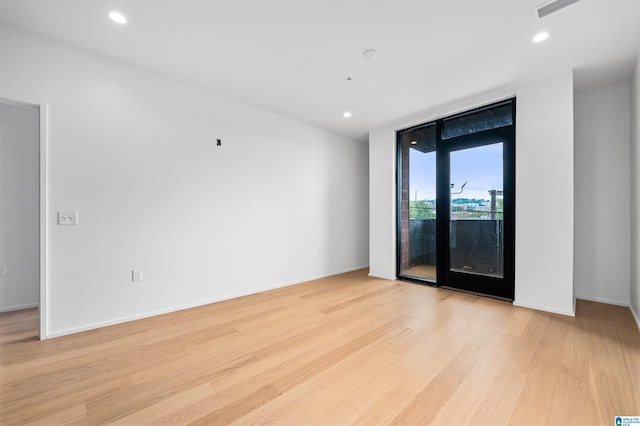 empty room featuring light wood-type flooring