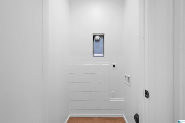 laundry area with washer hookup, electric dryer hookup, and hardwood / wood-style floors