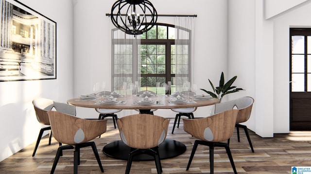 dining space with hardwood / wood-style floors, an inviting chandelier, and a wealth of natural light