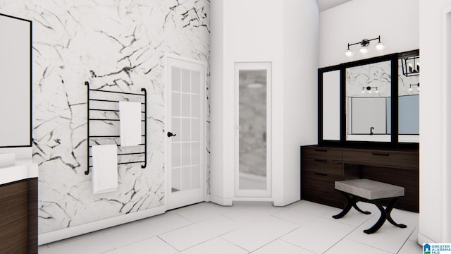 bathroom featuring tile patterned flooring and vanity