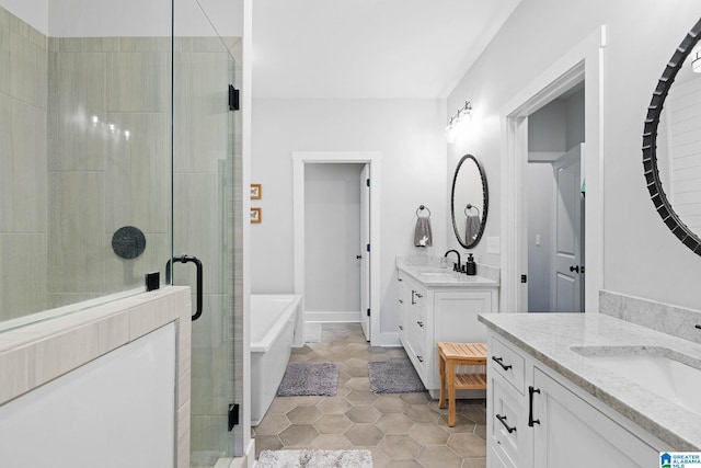 bathroom with tile floors, dual bowl vanity, and separate shower and tub