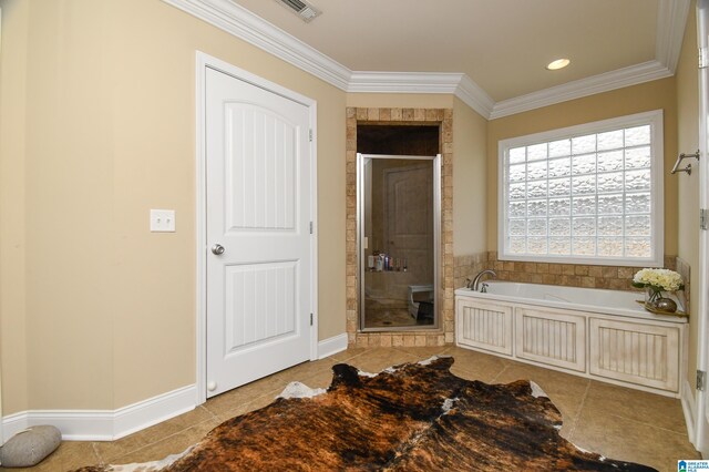 interior space with crown molding and light tile floors