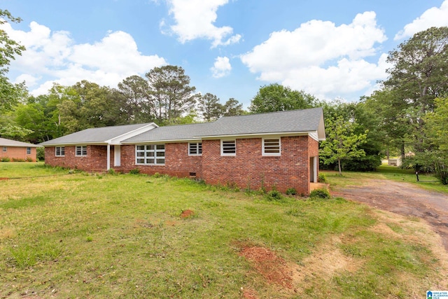 exterior space with a front lawn