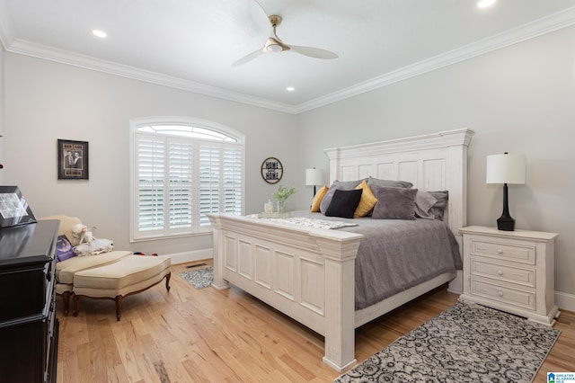 bedroom with crown molding, light hardwood / wood-style flooring, and ceiling fan