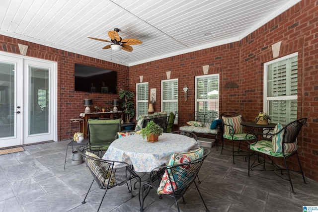 view of patio / terrace featuring ceiling fan