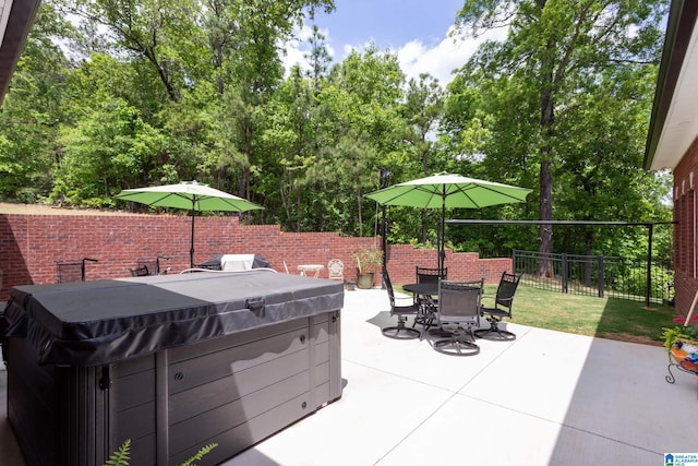 view of patio with a hot tub