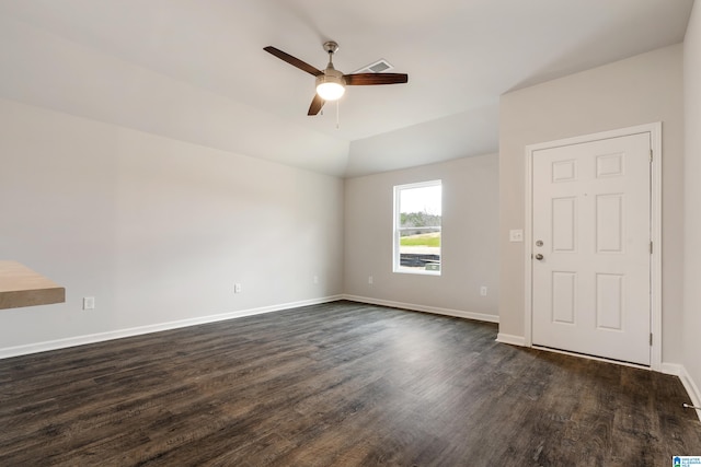 empty room featuring ceiling fan and dark hardwood / wood-style floors