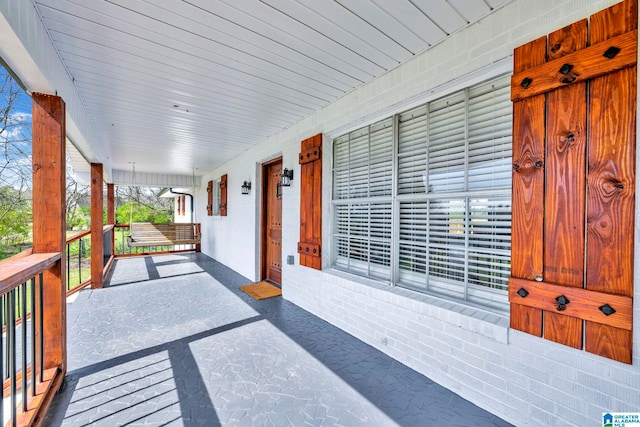 deck with covered porch