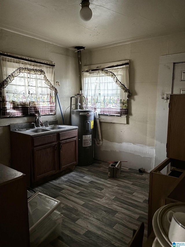 3110 N 31st Ave N, Birmingham, AL 35207 - kitchen featuring a sink, water heater, and dark wood-type flooring