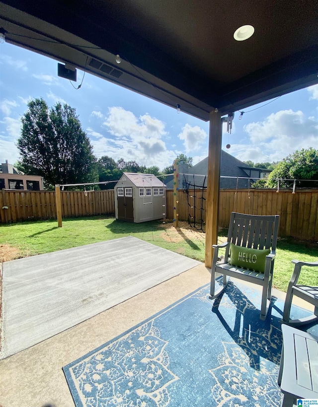 view of patio with a storage shed