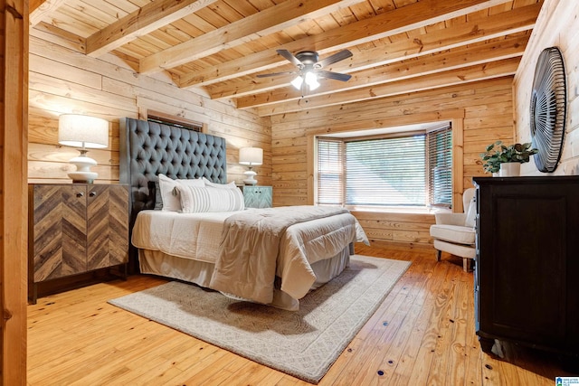 bedroom with beamed ceiling, light hardwood / wood-style flooring, wooden ceiling, and ceiling fan