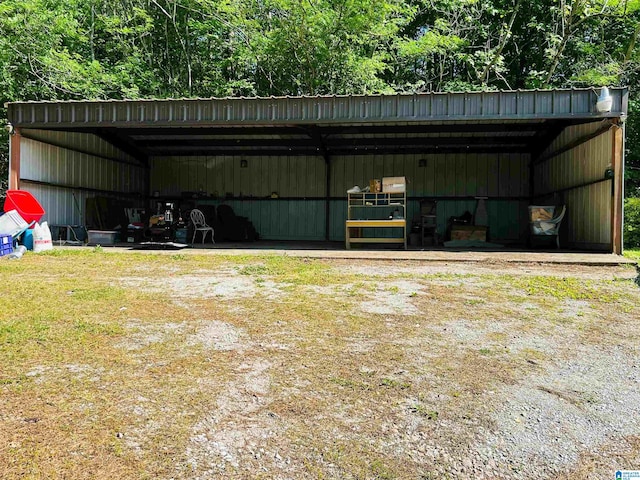 view of outbuilding featuring a yard