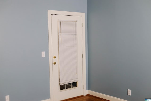 interior details featuring hardwood / wood-style flooring