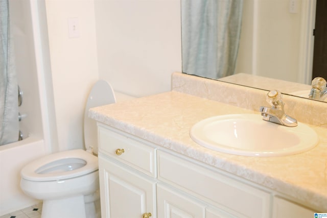 full bathroom featuring shower / bath combination with curtain, vanity, tile patterned floors, and toilet