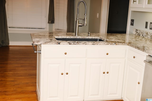 interior space featuring sink and hardwood / wood-style floors