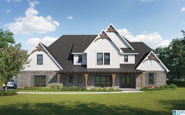 modern farmhouse with a standing seam roof, brick siding, a front lawn, and roof with shingles