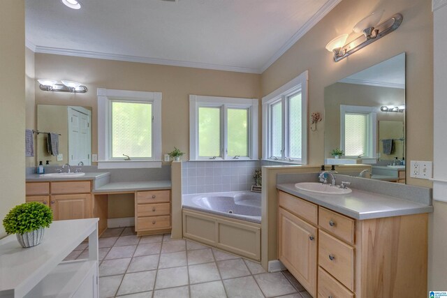 bathroom with a tub, plenty of natural light, tile flooring, and double vanity