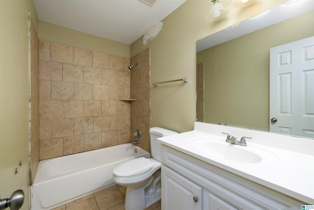 full bathroom featuring tiled shower / bath combo, toilet, tile flooring, and vanity