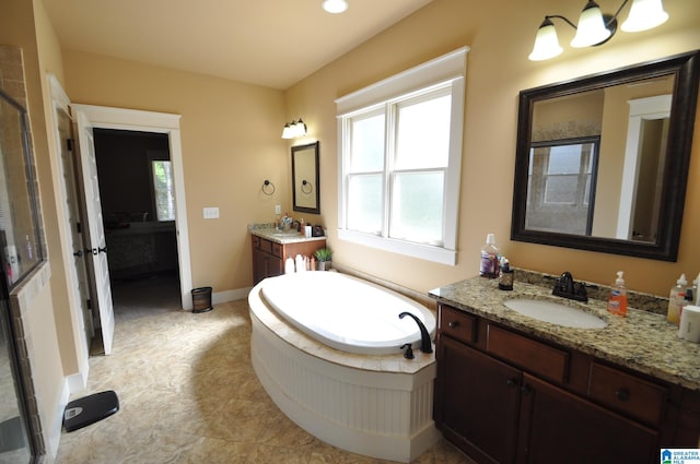 bathroom featuring tile floors, double vanity, and a bathtub