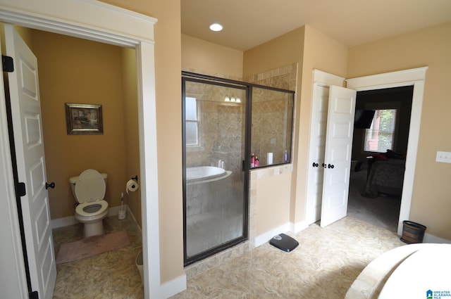 bathroom with plus walk in shower, tile floors, and toilet