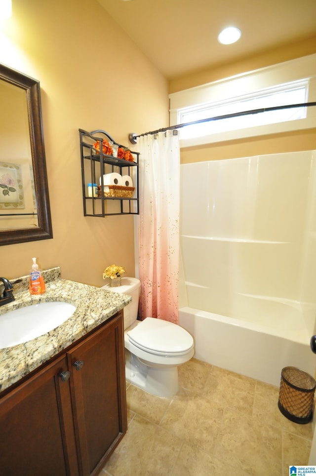 full bathroom featuring tile floors, shower / tub combo, toilet, and vanity