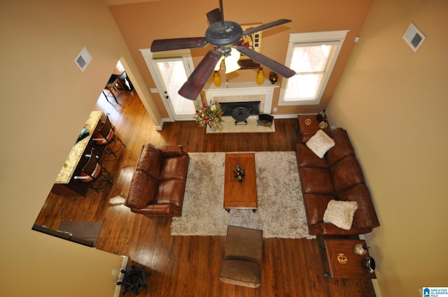 interior space featuring hardwood / wood-style flooring, a wealth of natural light, and ceiling fan