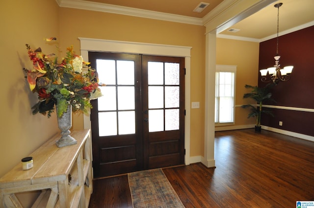 doorway featuring french doors, crown molding, and dark hardwood / wood-style floors