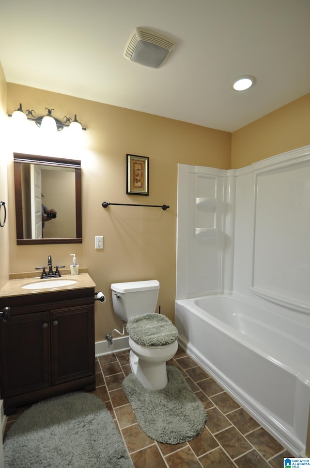 full bathroom featuring shower / washtub combination, oversized vanity, toilet, and tile floors