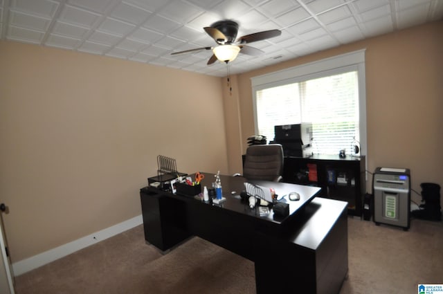 home office featuring ceiling fan and carpet