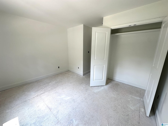 unfurnished bedroom with a closet