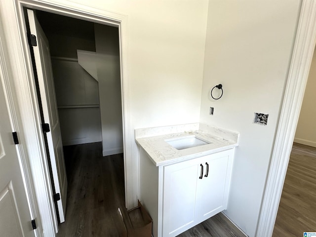 bathroom with wood-type flooring and vanity