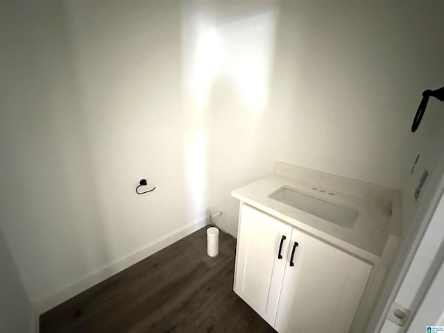 bathroom featuring vanity and hardwood / wood-style floors