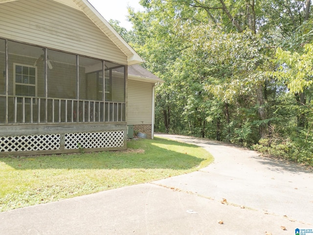 view of yard with a sunroom