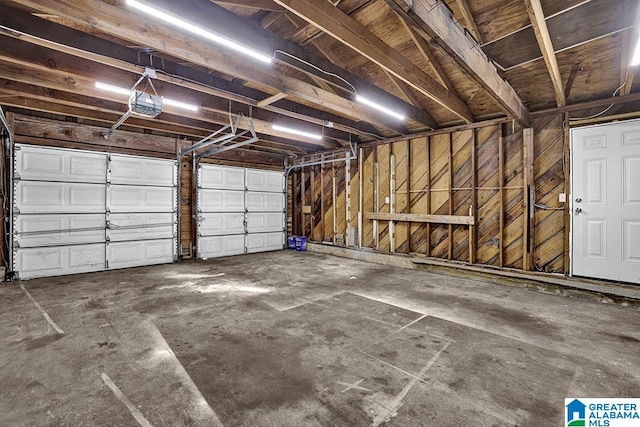 garage featuring a garage door opener