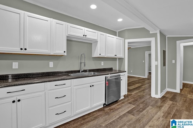 kitchen featuring crown molding, white cabinets, sink, dark hardwood / wood-style flooring, and stainless steel dishwasher