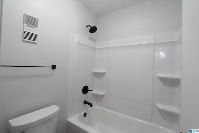 bathroom with toilet and shower / bathtub combination