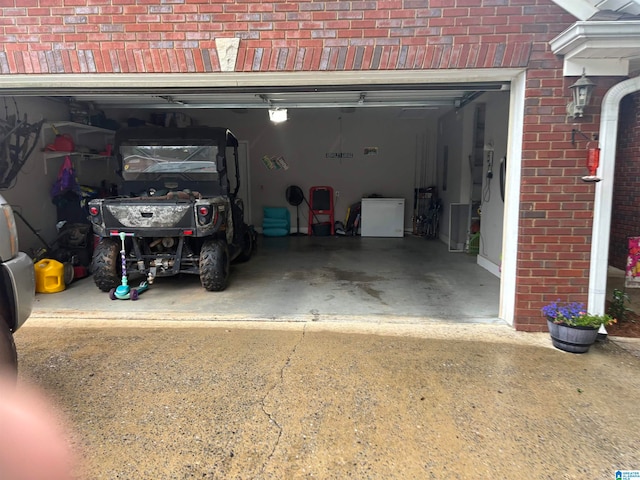 garage featuring refrigerator