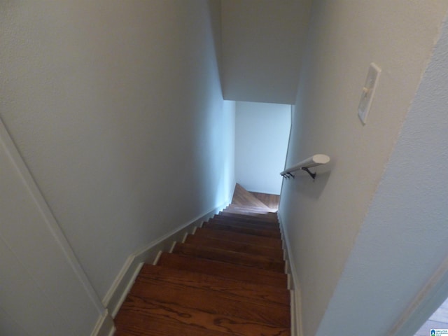 stairway with wood-type flooring