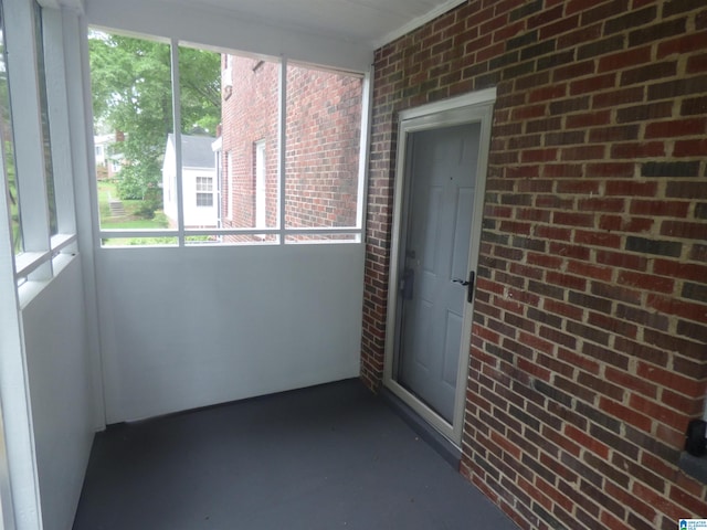 unfurnished sunroom with a healthy amount of sunlight