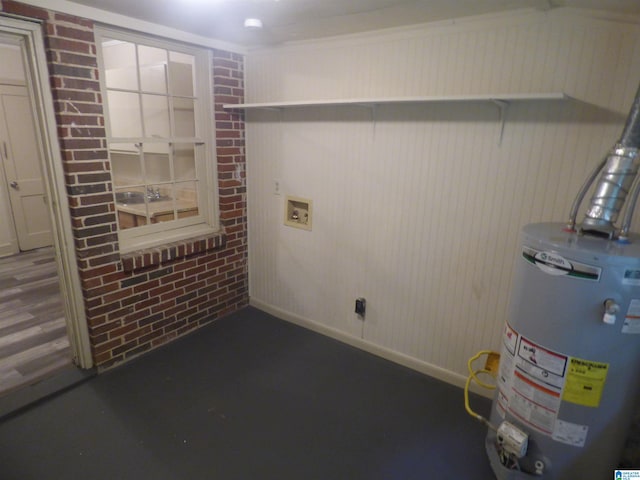 interior space with water heater, brick wall, and dark hardwood / wood-style flooring