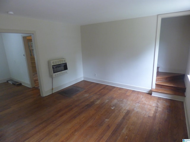 unfurnished room featuring dark hardwood / wood-style flooring