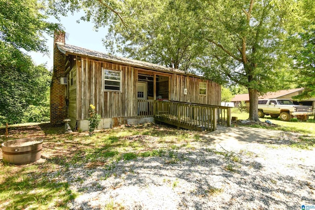 view of front of property featuring a chimney