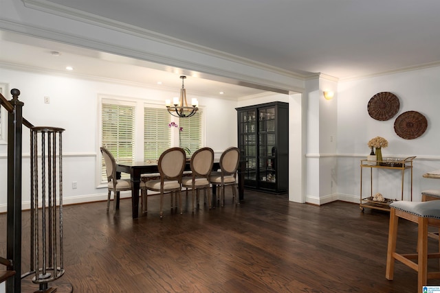 dining space featuring a notable chandelier, dark hardwood / wood-style flooring, and crown molding