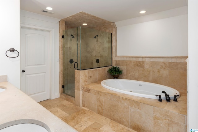 bathroom with shower with separate bathtub, tile flooring, and double sink